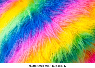 Flamboyant Rainbow Colored Background Of Fuzzy Fake Fur