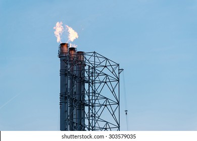 Flame Burning On Top Of Flare Stack 