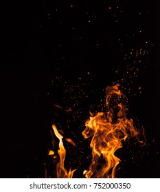 Flame of fire on a black background . - Shutterstock ID 752000350