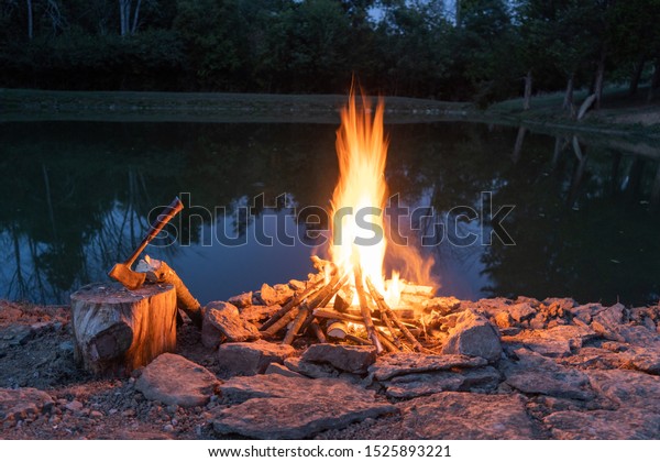 Flame Fire Pit Rocks Hatchet On Stock Photo Edit Now 1525893221