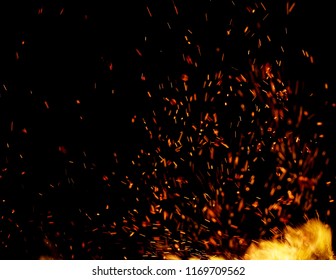 Flame Of Fire With Sparks On A Black Background