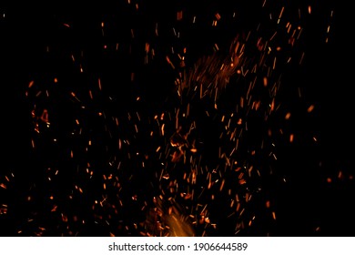 flame of fire with sparks on a black background - Shutterstock ID 1906644589
