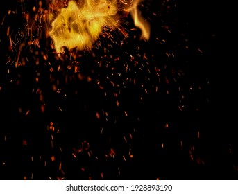 Flame Of Fire With Sparks On A Black Background