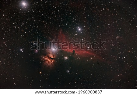 flame and horse head nebula in the orion constellation surrounded by h alpha dust in deep space taken with modified dslr camera