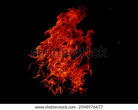 Flame Flame Texture For Strange Shape Fire Background Flame meat that is burned from the stove or from cooking. danger feeling abstract black background Suitable for banners or advertisements.