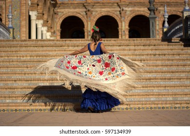 A Flamenco Dancer In The Plaza Of Spain Seville