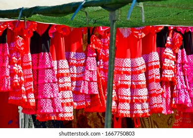 Flamenco Dresses At The Flea Market In Polop De La Marina, Alicante Province, Costa Blanca, Spain, March 8, 2020