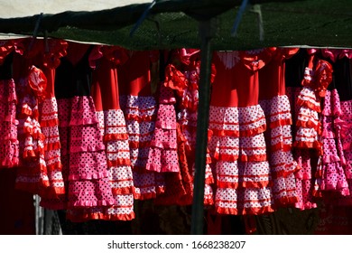 Flamenco Dresses At The Flea Market In Polop De La Marina, Alicante Province, Costa Blanca, Spain, March 8, 2020