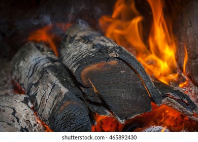 Flames burning wood in your home fireplace - Shutterstock ID 465892430