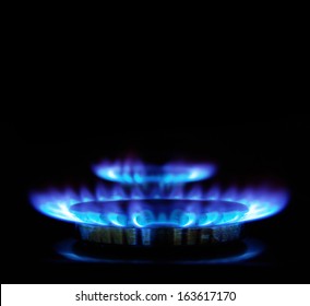 flames of gas stove in the dark       - Shutterstock ID 163617170