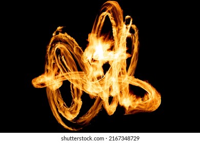 Flames On Long Hatchet. Traces Of Fire In Dark. Flames Spread Chaotically In Space.