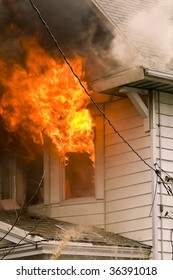 Flames And Smoke Of A Bad House Fire