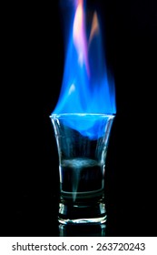 Flaming Drink On Black Backdrop