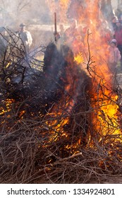 Flaming fire. Burning tree branches. Pagan rite dedicated to the arrival of spring. Big bonfire on Shrovetide. Auto-da-fe, ritual of public punishment, burning at the stake.