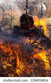 Flaming fire. Burning tree branches. Pagan rite dedicated to the arrival of spring. Big bonfire on Shrovetide. Auto-da-fe, ritual of public punishment, burning at the stake.