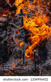 Flaming fire. Burning tree branches. Pagan rite dedicated to the arrival of spring. Big bonfire on Shrovetide. Auto-da-fe, ritual of public punishment, burning at the stake.