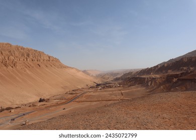 The Flaming Mountains (Chinese: 火焰山; pinyin: huǒyànshān) or Huoyan Mountains, are barren, eroded, red sandstone hills in the Tian Shan of Xinjiang.