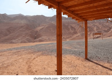 The Flaming Mountains (Chinese: 火焰山; pinyin: huǒyànshān) or Huoyan Mountains, are barren, eroded, red sandstone hills in the Tian Shan of Xinjiang.