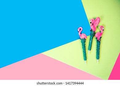 flamingo ball pen on vibrant colors background top view summer vacation - Shutterstock ID 1417394444