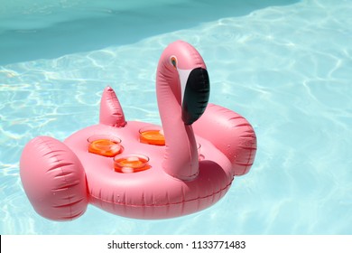 Flamingo Drink Holder With Aperol Spritz In A Pool Party