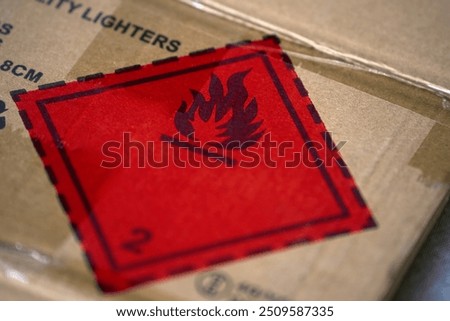 Flammable material warning on shipping carton
