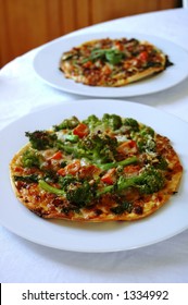 Flammekuche, Alsatian Onion And Bacon Tart With Some Broccoli Rabe, Tomatoes, Parmesan Cheese, Cream