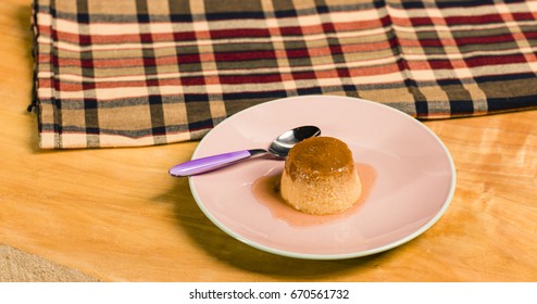 Flan - Creme Caramel On A Pink Disk