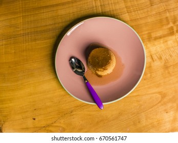 Flan - Creme Caramel On A Pink Disk