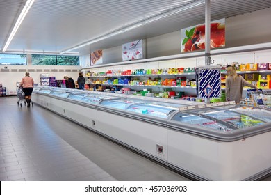 FLANDERS, BELGIUM - OCTOBER 20, 2015: Frozen food in freezer section of an Aldi discount supermarket, Aldi is a global discount supermarket chain with over 9,000 stores in over 18 countries.