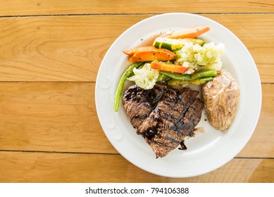 Flank Steak With Vegetables And Baked Potato