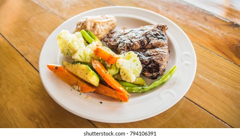 Flank Steak With Vegetables And Baked Potato