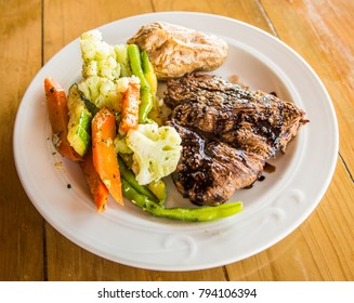 Flank Steak With Vegetables And Baked Potato