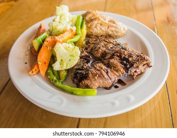 Flank Steak With Vegetables And Baked Potato