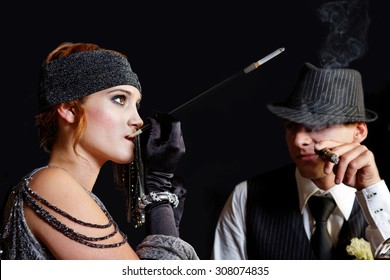 Flapper Girl Smoking And Young Gangster In Hat