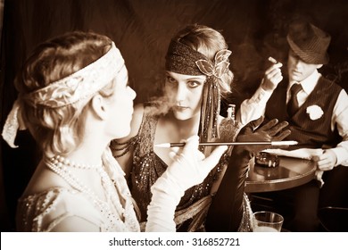 Flapper Girls And Young Gangster Smoking In The Bar