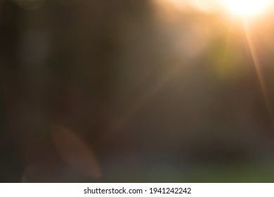 Flare Abstract Blurred Background With Sun Flare. A Backdrop Bokeh Spotlight For Photo Overlay