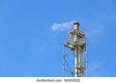 Flare Stack With Blue Sky