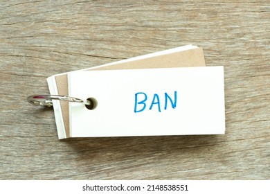 Flash card with handwriting word ban on wood background - Shutterstock ID 2148538551