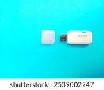 Flashdisk 32 GB isolated on blue background.