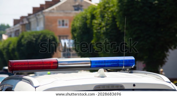 Flashing lights on the\
police car close-up