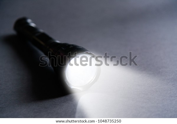 Flashlight Beam Light On Dark Background Stock Photo (Edit Now) 1048735250