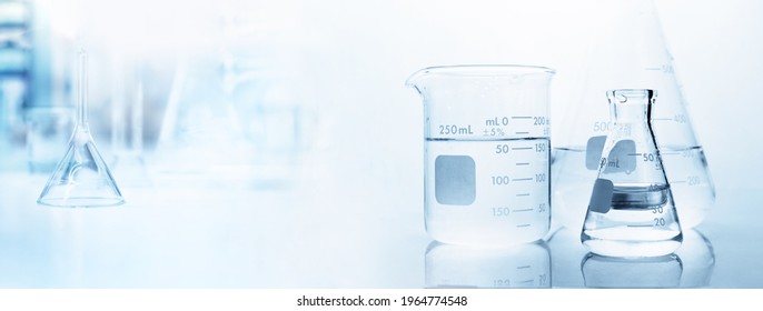 Flask With Clear Beaker And Glassware In Medical Science Lab Banner Background