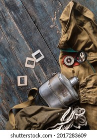 flask jacket and compass for travel