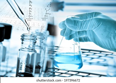 Flask in scientist hand and test tube