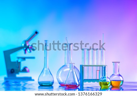 Flasks with reagents. Laboratory glassware. Medical glass flasks. Chemical laboratory. Laboratory diagnostics. Chemical analysis. Biochemistry. Pharmacology.