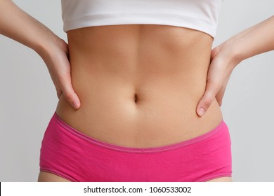 Flat Belly With Hands On Belt