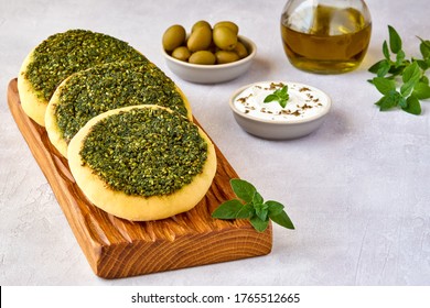 Flat Bread With Zaatar, Arabic Manakeesh And Labaneh .