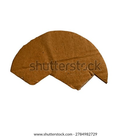 Flat brown bread slice with crusty edges
