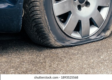 Flat Car Tire Close Up, Punctured Wheel