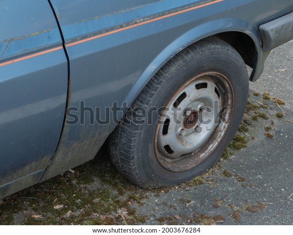 Flat Car Tire on Asphalt\
